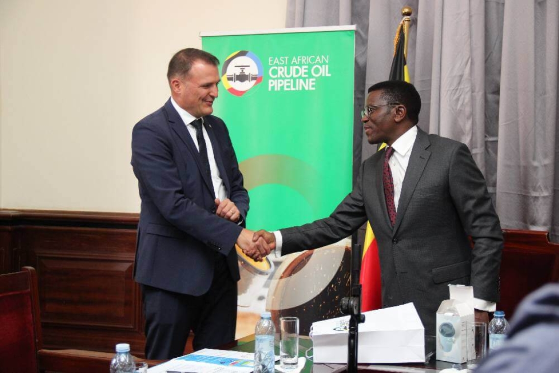 Katikkiro Charles Peter Mayiga shakes hands with EACOP Managing Director Guillaume Dulout at Bulange, Mengo Katikkiro Charles Peter Mayiga shakes hands with EACOP Managing Director Guillaume Dulout at Bulange, Mengo